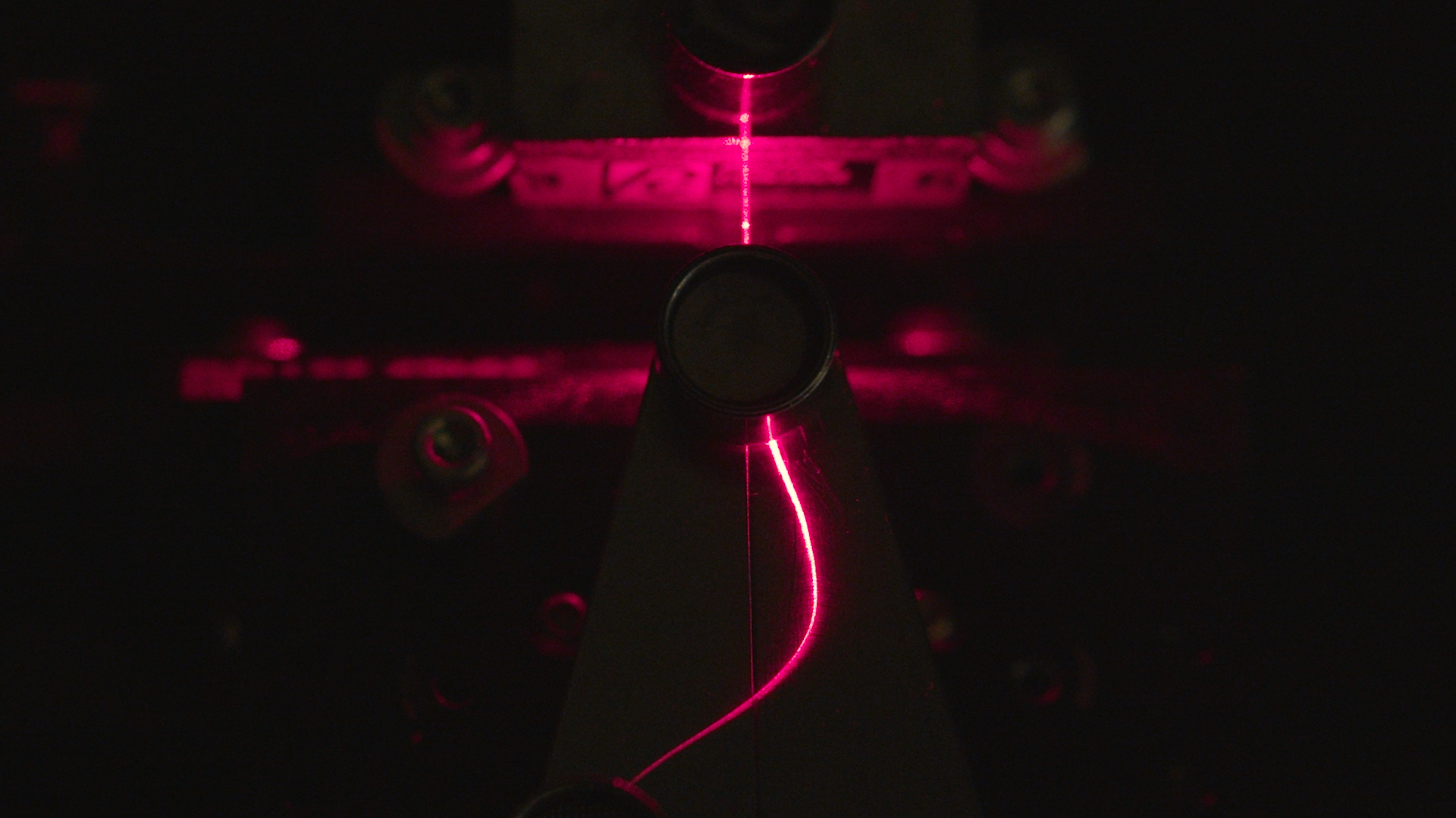 Light traveling through an optical fibre made of cellulose by VTT