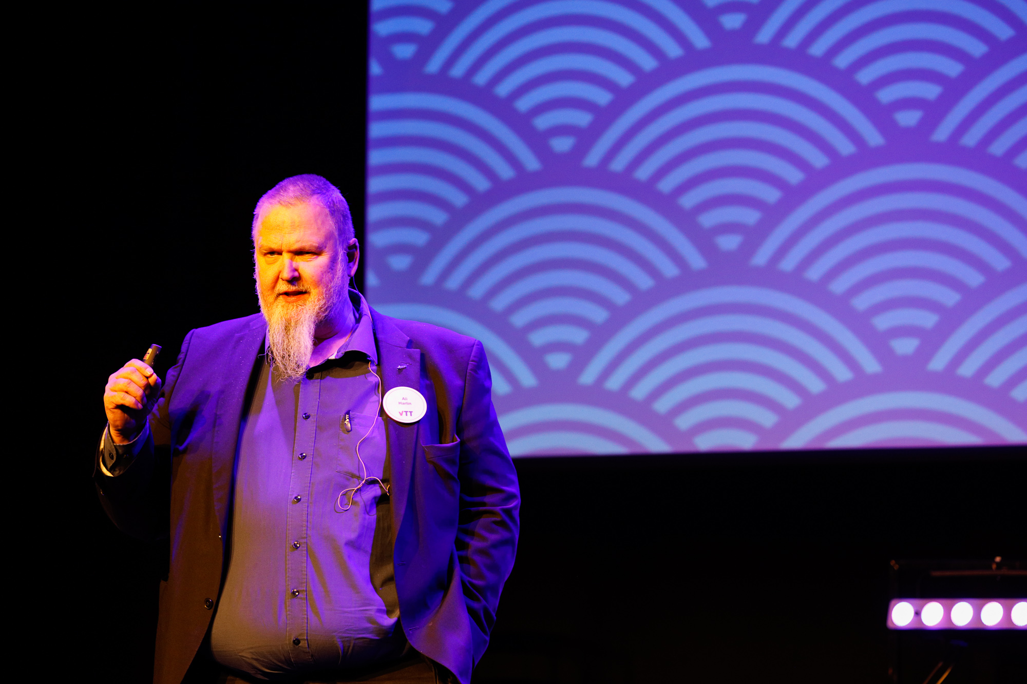 Photo of VTT's Ali Harlin speaking at an event.