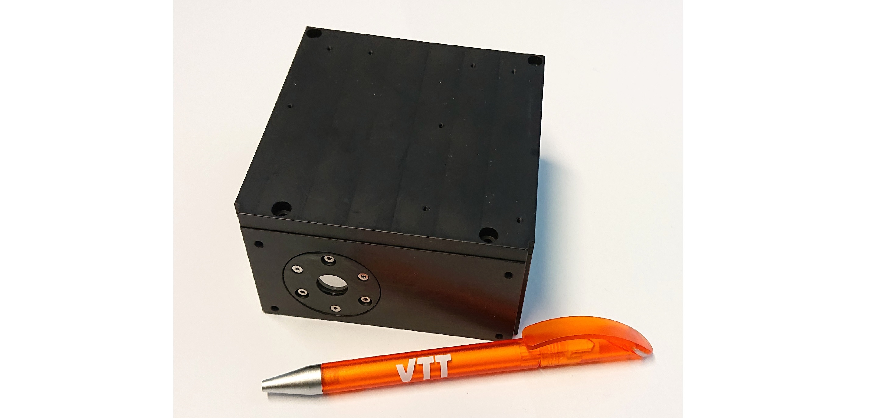 VISION instrument next to a ballpoint pen that is roughly the same length
