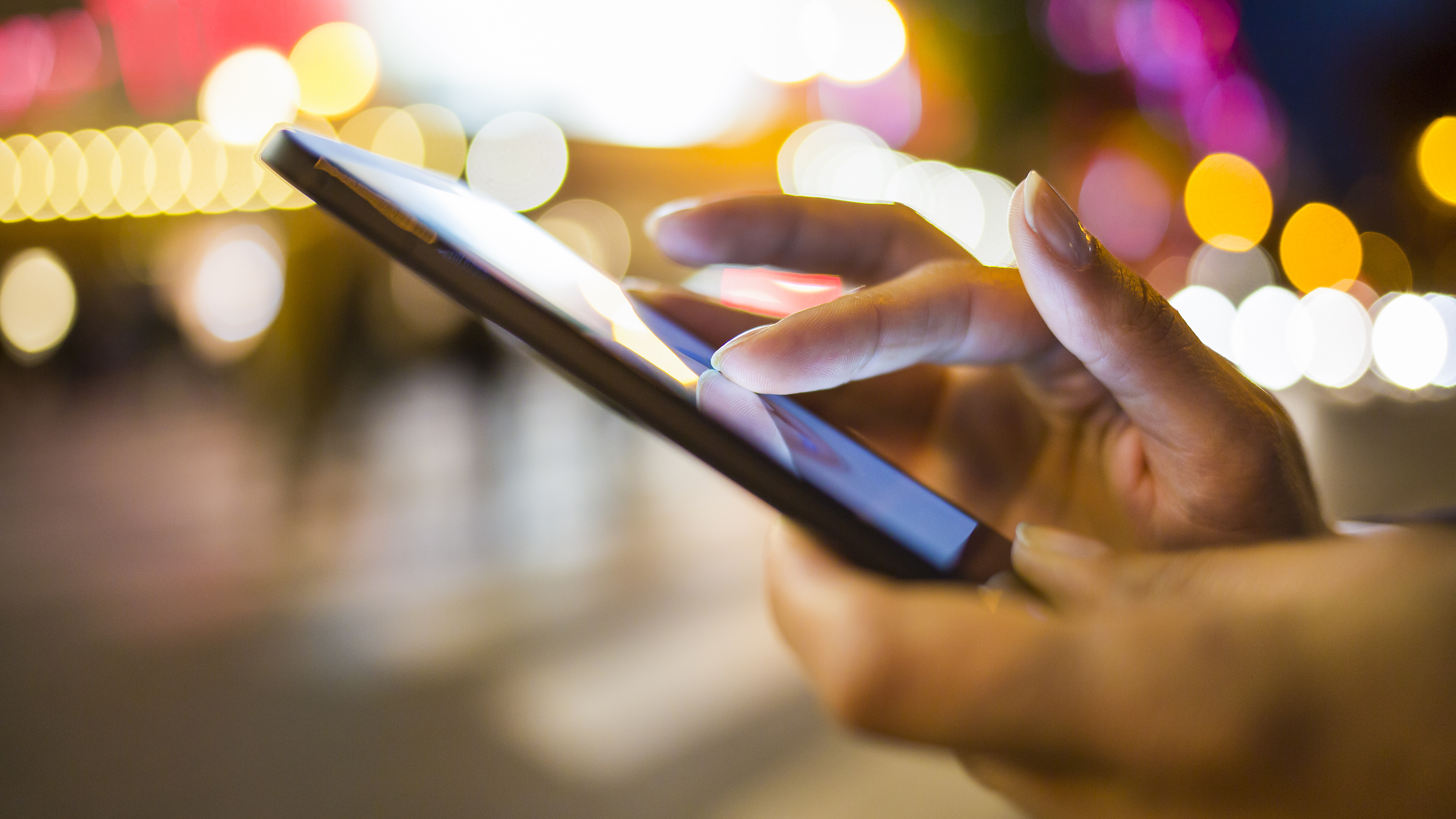 Close up of hands using a smart phone