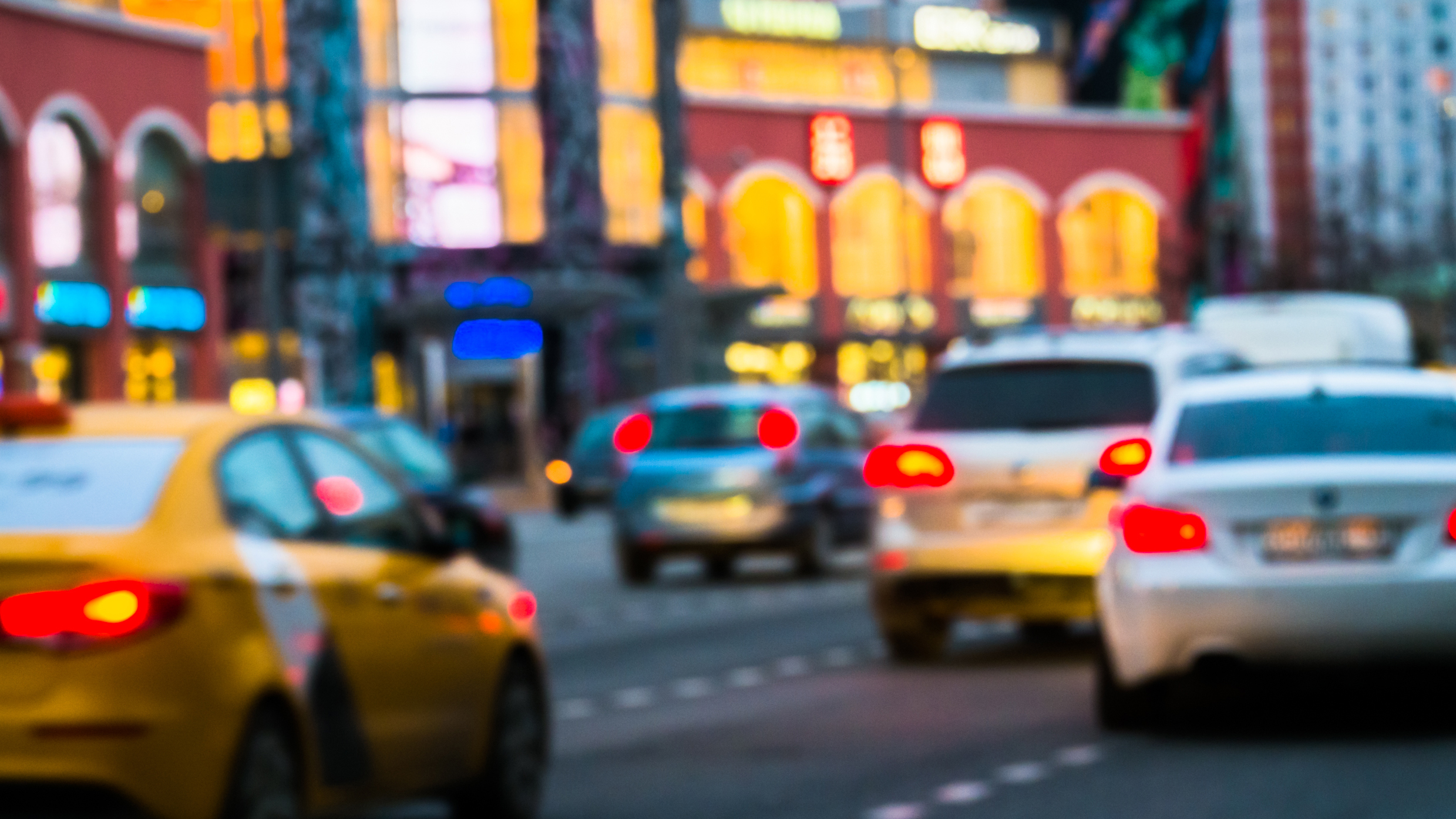 Blurry photo of cars in rush hour traffic