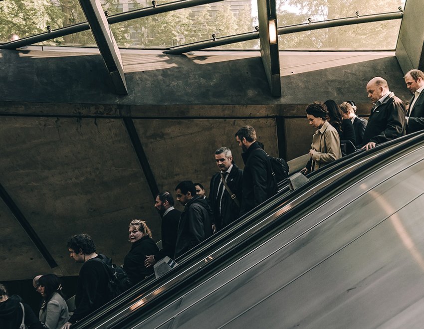 People going down on an escalator