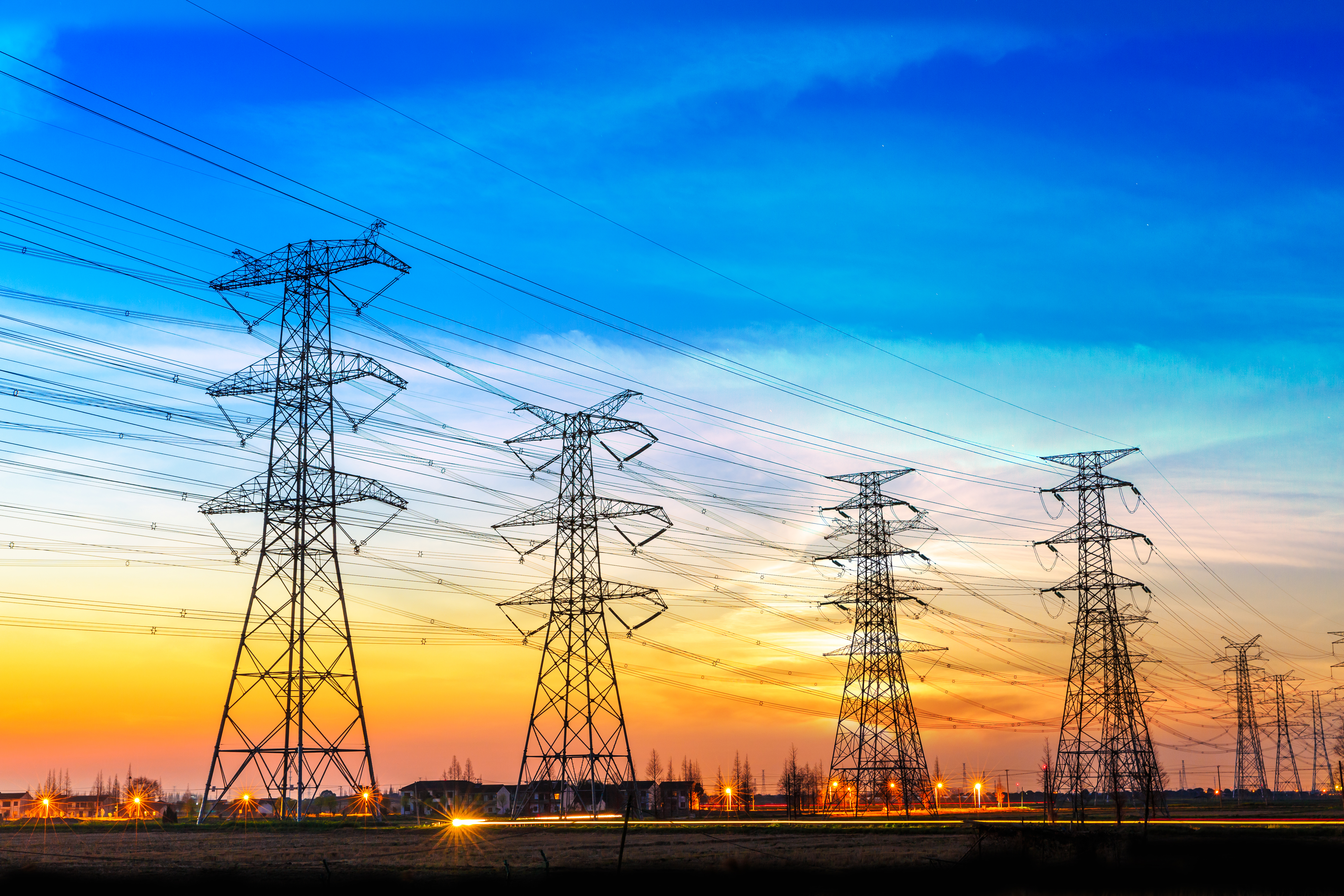 Electricity power lines at sunset