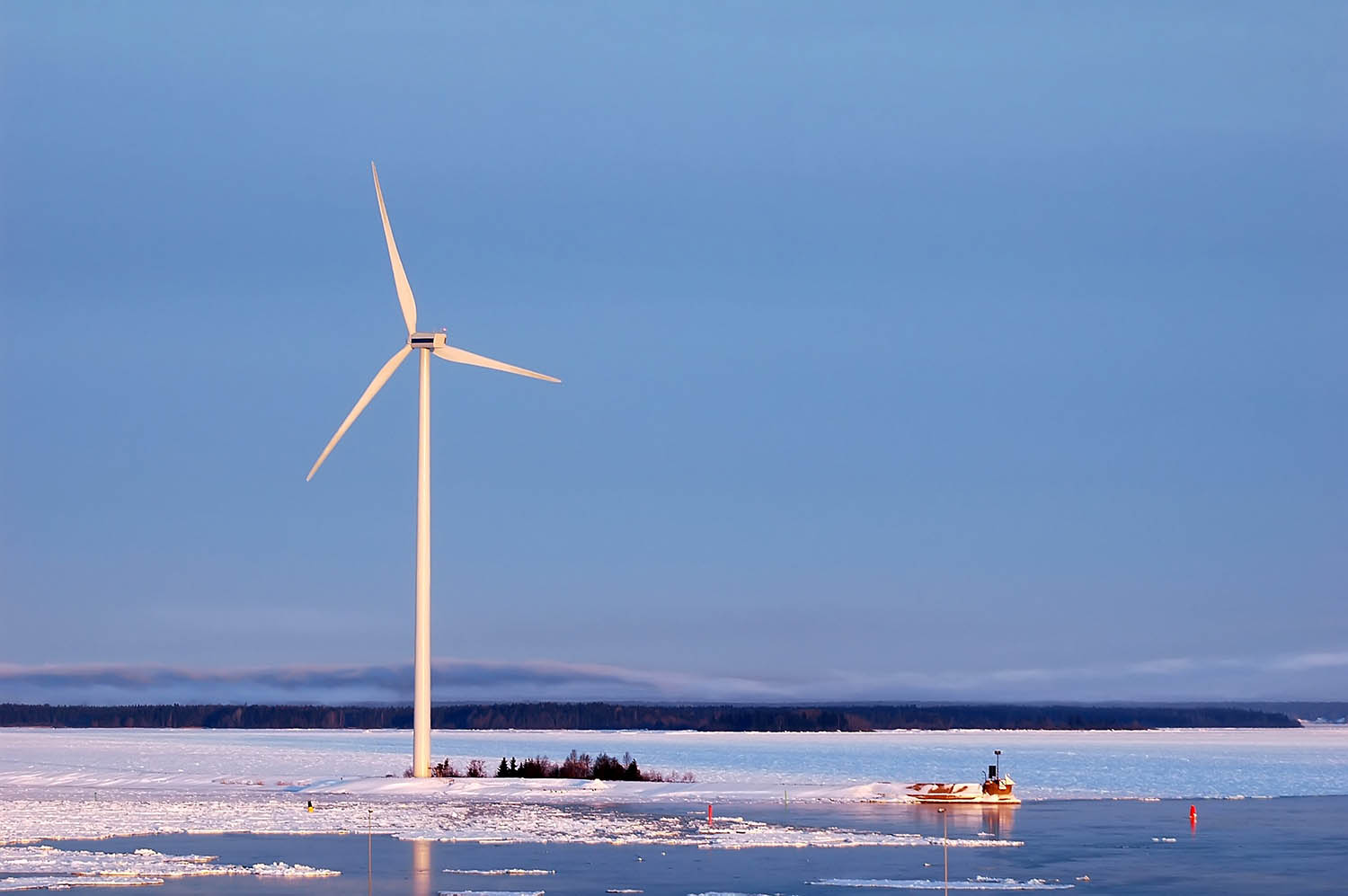 Wind turbine by icy sea