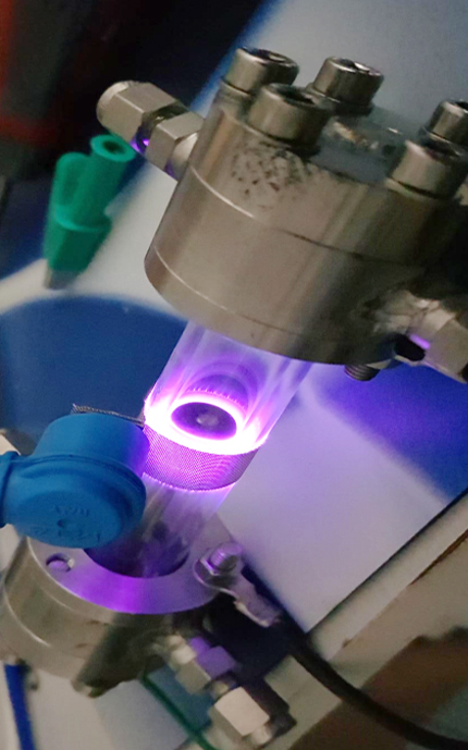 A closeup of the plasma reactor. The project investigated the use of plasma to convert hydrogen and captured carbon dioxide into hydrocarbons.