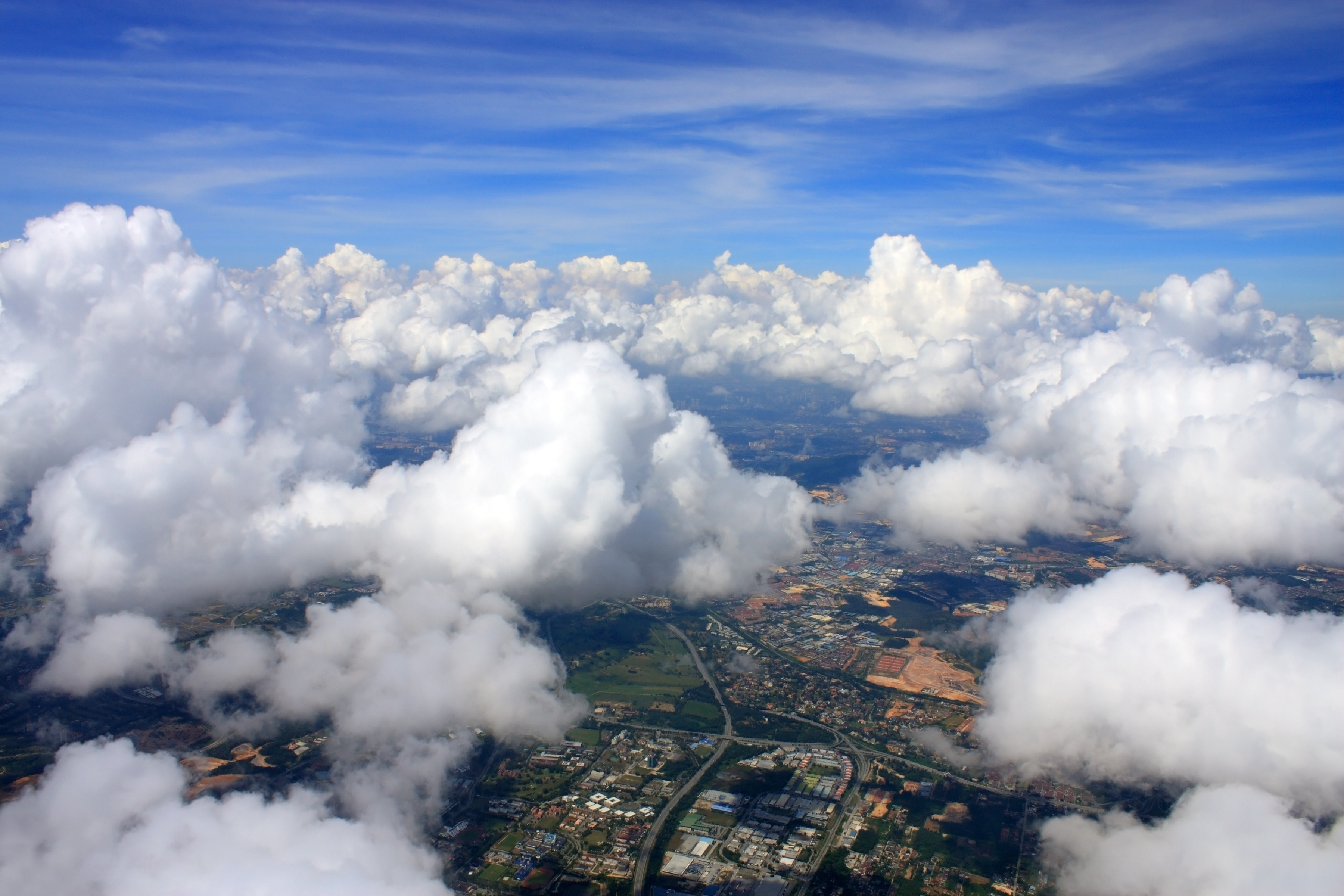 Clouds drifting over town