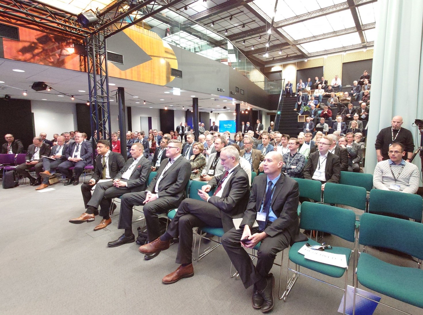 Uspace event audience sitting on chairs