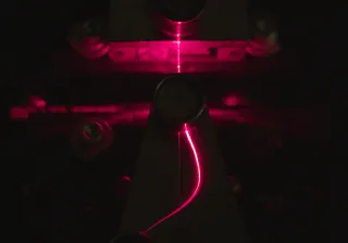 Light traveling through an optical fibre made of cellulose by VTT