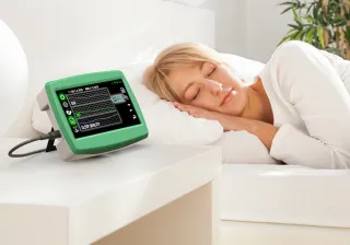 Woman sleeping with eLive monitor