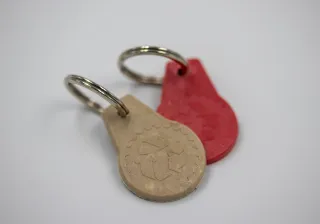 Twotrolleytokensmadefromthermomechanicallyrecycledtextiles