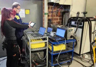 Two researchers working on METECHproject.