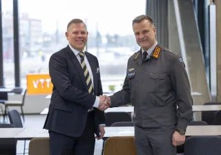 Persons shaking hands