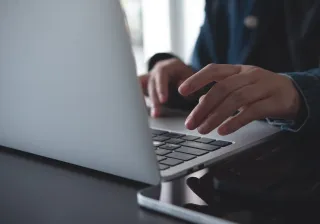 working on a laptop