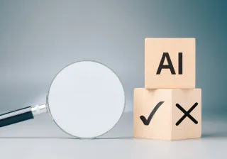 two buildingblocks with AI and ok mark