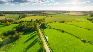Aerial photo of a rural farmland field on a sunny day