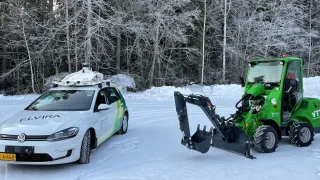 vtt autonomous self driving car and vehicle parked on a snowy lot