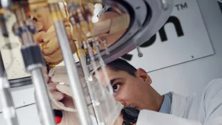 SemiQon scientist working with quantum computer cryostat