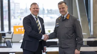 Persons shaking hands