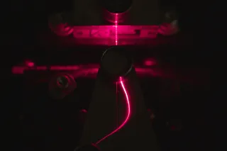 Light traveling through an optical fibre made of cellulose by VTT
