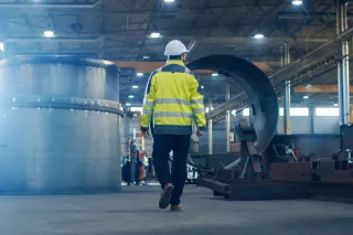 Industrial Engineer in Hard Hat Wearing Safety Jacket