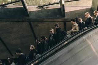 People going down on an escalator