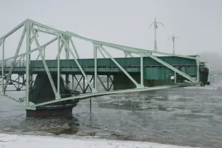 Swing bridge on a frozen river