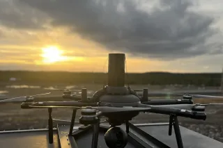 a drone in a sunset