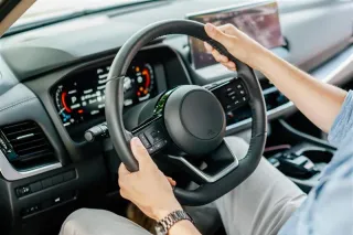 Person driving a car