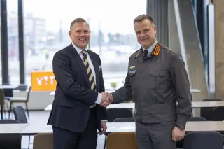 Persons shaking hands