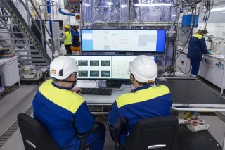personnel monitoring a process