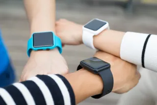 Threearmsholdingsmartwatches