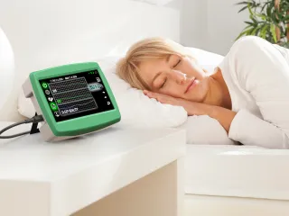 Woman sleeping with eLive monitor