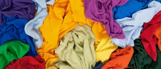 A photo of a pile of colourful clothes