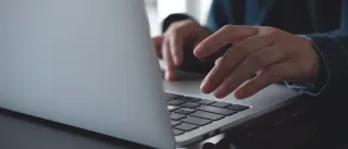 working on a laptop