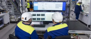 personnel monitoring a process