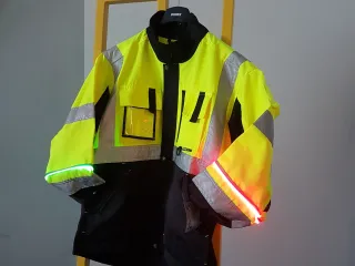 Smart jacket on a hanger with led lights on the sleeves