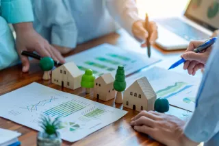 Corporate office conducted analysis with green, environmentally friendly approach, demonstrating business growth and commitment to sustainability in environment.