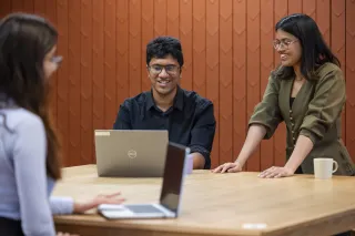 VTTers working together on laptop