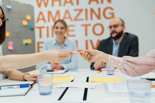 a group of office workers workshopping