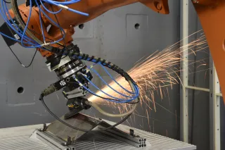 industrialrobotweldingmetalpartandsparks